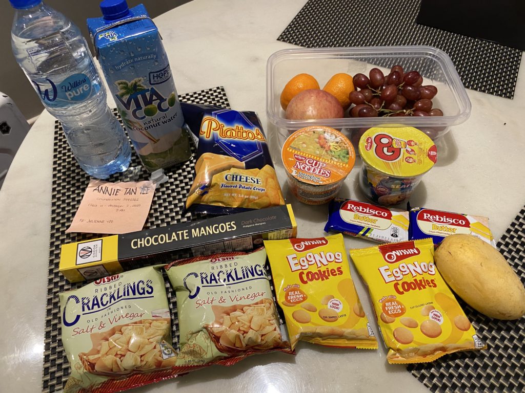 A variety of snacks and drinks arranged on a table.