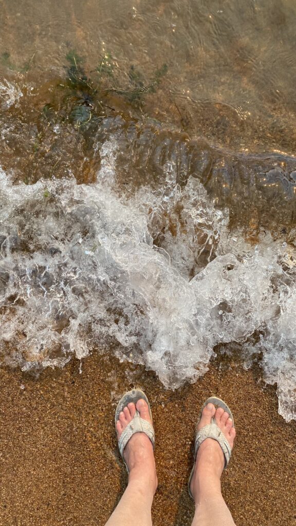 feet on the beach