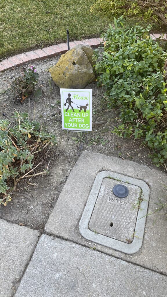 oic up dog's poo sign
